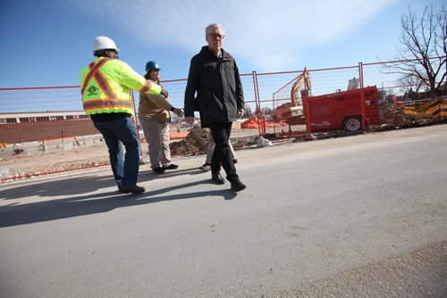 RUTH BONNEVILLE / WINNIPEG FREE PRESS  Greg Selinger leaves construction site at Red River College, Notre Dame campus after announcing new spending for more construction jobs in Manitoba at presser Wedesday.   March 23, 2016