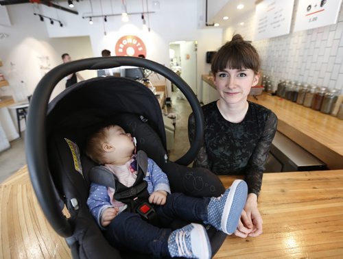 WAYNE GLOWACKI / WINNIPEG FREE PRESS  Meghan Zahari, co-owner of Bronuts in the Exchange district, faced online criticism after breastfeeding her daughter Emelyn in the cafe area.  Shannon Sampert story.  March 23 2016