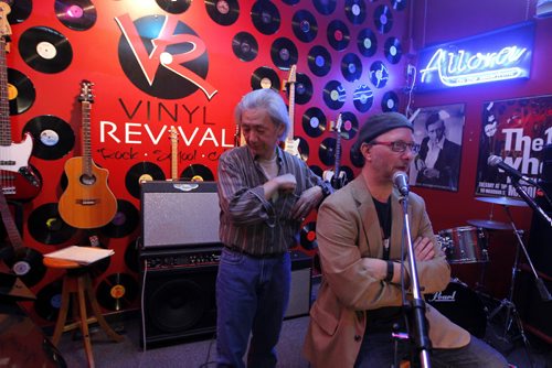 BORIS MINKEVICH / WINNIPEG FREE PRESS Vinyl Revival - for photo page on the store's open mic night every Wednesday. It's a really cool vibe/atmosphere. It usually gets about 50-60 people. L-R Hiromi Osawa and Darren Sawchuk (owner). Photo taken March 23, 2016