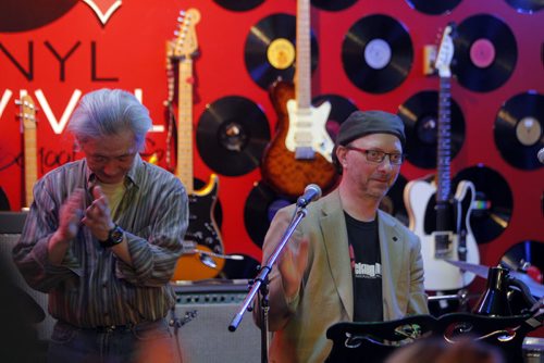 BORIS MINKEVICH / WINNIPEG FREE PRESS Vinyl Revival - for photo page on the store's open mic night every Wednesday. It's a really cool vibe/atmosphere. It usually gets about 50-60 people. L-R Hiromi Osawa and Darren Sawchuk (owner). Photo taken March 23, 2016