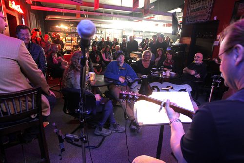 BORIS MINKEVICH / WINNIPEG FREE PRESS Vinyl Revival - for photo page on the store's open mic night every Wednesday. It's a really cool vibe/atmosphere. It usually gets about 50-60 people. Fred Narozniak performs to the packed house. Photo taken March 23, 2016