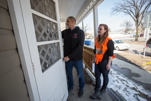 MIKE DEAL / WINNIPEG FREE PRESS NDP candidate Kevin Chief goes door knocking with canvasser Alissa Prevost Thursday afternoon. 160324 - Thursday, March 24, 2016