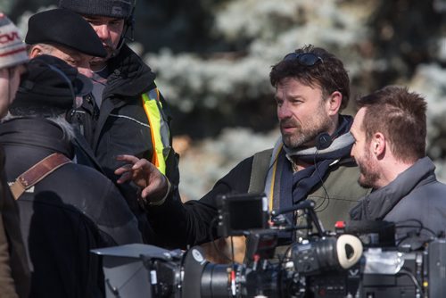 MIKE DEAL / WINNIPEG FREE PRESS Director David Hyde (centre) chats with Michael Edlund (right) and Michael Ironside (left) and other members of the crew during a break in shooting on the last day of filming for the feature film Stegman is Dead in the Leo Mol garden at Assiniboine Park Wednesday. 160323 - Wednesday, March 23, 2016