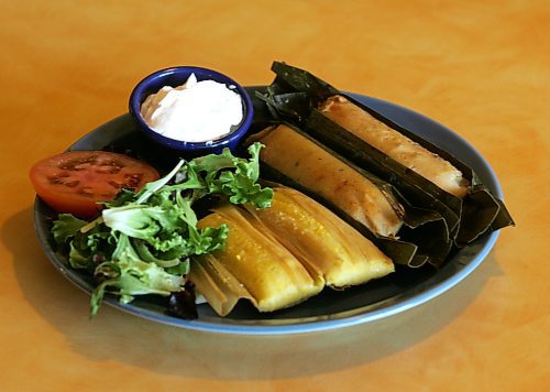 BORIS MINKEVICH/WINNIPEG FREE PRESS  080305 La Fiesta Cafecito. A plate with corn &amp; chicken Tamales.