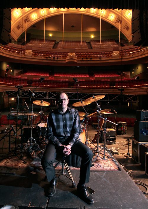 PHIL HOSSACK / WINNIPEG FREE PRESS Kevin Donnelly poses onstage with the house at his back Thursday. He gave Geoff Kirbyson a tour of some backstage utilitarian renovations True North has done at the historic theatre. See Kirbyson's story. March 24, 2016