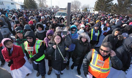 PHIL HOSSACK / WINNIPEG FREE PRESS A thousand strong of the faithfull in a public procession from St Peter's Church on Keewatin street Friday morning to follow the "Stations of the Cross" as Easter weekend begins for Christians world wide. See Scott Billeck story. March 25, 2016