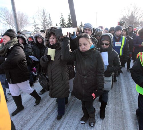 PHIL HOSSACK / WINNIPEG FREE PRESS A thousand strong of the faithfull in a public procession from St Peter's Church on Keewatin street Friday morning to follow the "Stations of the Cross" as Easter weekend begins for Christians world wide. See Scott Billeck story. March 25, 2016