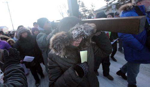 PHIL HOSSACK / WINNIPEG FREE PRESS A thousand strong of the faithfull in a public procession from St Peter's Church on Keewatin street Friday morning to follow the "Stations of the Cross" as Easter weekend begins for Christians world wide. See Scott Billeck story. March 25, 2016