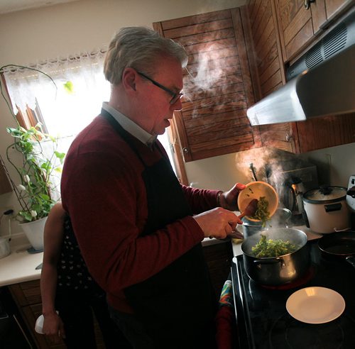 PHIL HOSSACK / WINNIPEG FREE PRESS NDP leader Greg Selinger joined Sernadilla tfamily to prepare a traditional Philippino dish of boiled vegitables Friday and to make an announcement re:the family reunification stream. See Scott Billeck story  March 25, 2016