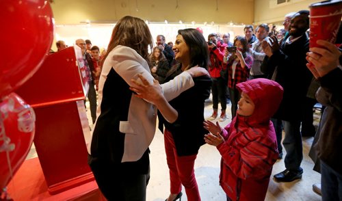 TREVOR HAGAN / WINNIPEG FREE PRESS Liberal Party leader, Rana Bokhari, right, with Johanna Wood, MLA candidate for Fort Garry-Riverview, at the opening of her campaign headquarters in Osborne Village, Saturday, March 26, 2016.