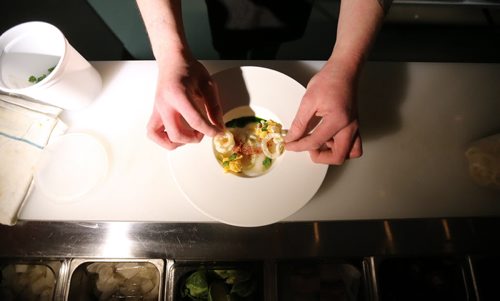 TREVOR HAGAN / WINNIPEG FREE PRESS Sous Chef, Matt Edmond, preparing Scallop Crudo with Truffled Chawanmushi at Maque, Friday, March 25, 2016. For Barley Kives review.