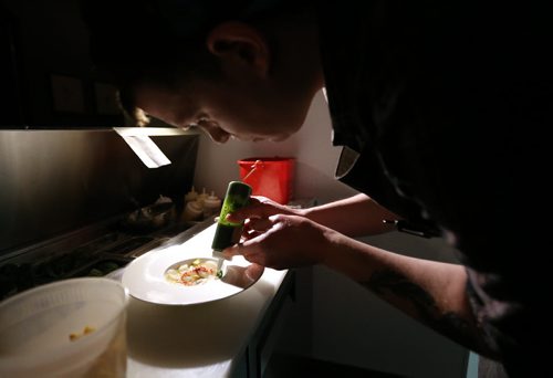 TREVOR HAGAN / WINNIPEG FREE PRESS Sous Chef, Matt Edmond, preparing Scallop Crudo with Truffled Chawanmushi at Maque, Friday, March 25, 2016. For Barley Kives review.