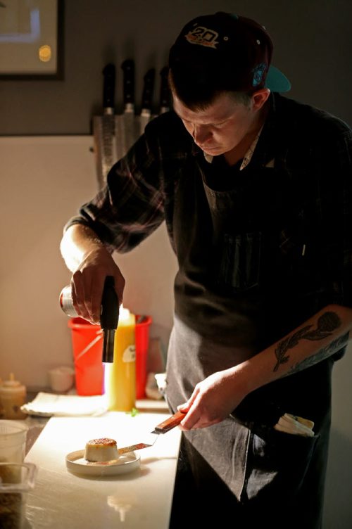 TREVOR HAGAN / WINNIPEG FREE PRESS Sous Chef, Matt Edmond, preparing Coconut Star Anise Pot de Creme, at Maque, Friday, March 25, 2016. For Barley Kives review.