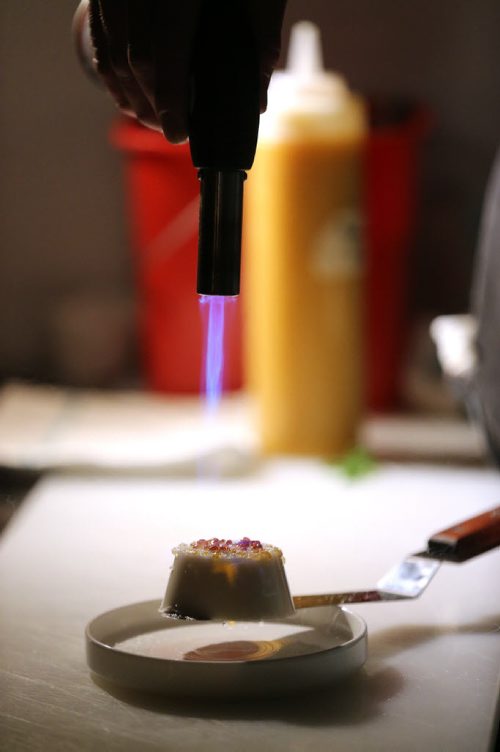 TREVOR HAGAN / WINNIPEG FREE PRESS Sous Chef, Matt Edmond, preparing Coconut Star Anise Pot de Creme, at Maque, Friday, March 25, 2016. For Barley Kives review.