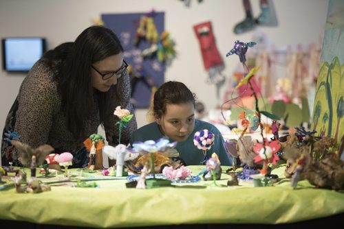 DAVID LIPNOWSKI / WINNIPEG FREE PRESS  Sophie(age 8) and mom Sarah Piché check out 'Faery Garden' at the WAG Saturday March 26, 2016 as part of an exhibit titled 'Through the Eyes of a Child', which the WAG describes as highlighting the creations of the young people who attend art classes at WAG Studio.