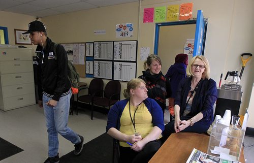 PHIL HOSSACK / WINNIPEG FREE PRESS Margaret Van Lau (right), Misty Belcourt and  Heather Robertson (sitting) talk with Carol Sanders about a new refugee assistance program where  NEEDS Centre Social workers will be working with refugee children in schools.  See Carol Sanders story. MARCH 29, 2016