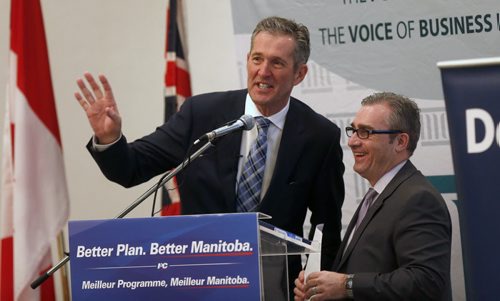 WAYNE GLOWACKI / WINNIPEG FREE PRESS   PC Leader Brian Pallister, left, at the podium with Chuck Davidson, president & CEO Manitoba Chambers of Commerce, Brian was the keynote speaker at the Chambers' breakfast Wednesday. ¤¤Kristin Annable  story  March 30 2016