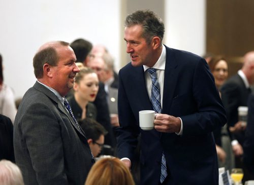WAYNE GLOWACKI / WINNIPEG FREE PRESS   PC Leader Brian Pallister, at right, chats with Larry McIntosh, pres. and CEO Peak of the Market at the Manitoba Chambers of Commerce breakfast Wednesday. Brian was the key note speaker at the event.¤ ¤¤Kristin Annable  story  March 30 2016