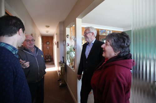 RUTH BONNEVILLE / WINNIPEG FREE PRESS  NDP leader Greg Selinger talks homeowners, Cliff and Bev Bernhardt (left and right of Selinger respectively), and Chris Parker with Build Wright Developments, inside their home in Elmwood before holding press conference in front of their home  announcing he will protect Mb. Hydro from privatization and help families save money on utility bills Wednesday. March 30, 2016