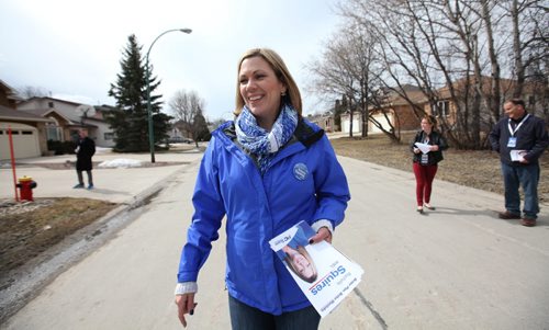 RUTH BONNEVILLE / WINNIPEG FREE PRESS  Riel area PC Candidate, Rochelle Squires, door knocking on Bethune Way in  St.Vital Wednesday.    March 30, 2016