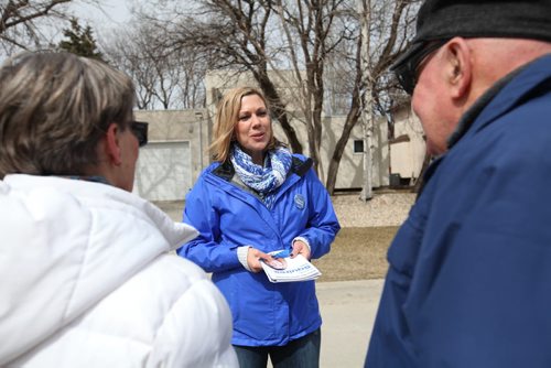 RUTH BONNEVILLE / WINNIPEG FREE PRESS  Riel area PC Candidate, Rochelle Squires, talks to residents on Bethune  Way  in St.Vital Wednesday afternoon.     March 30, 2016