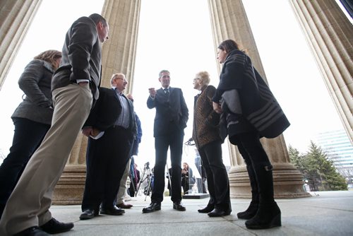 RUTH BONNEVILLE / WINNIPEG FREE PRESS  Progressive Conservative Leader Brian Pallister talks to PC candidates and concerned citizens on the steps of the Manitoba Legislative Building after holding a press conference illustrating a Vote Tax event  cheque made out to taxpayers of Manitoba Thursday afternoon.      March 31, 2016