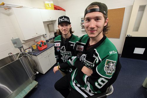 PHIL HOSSACK / WINNIPEG FREE PRESS Portage Terriers twins Shawn Bowles (left) and Brad Bowles (right) are on the brink of wrapping up the MJHL career, and looking ahead to a possible future as a CIS deadly duo. They're posing before a team workout in Portage la Prairie Thursday evening. See Melissa Martin's story.  MARCH 31, 2016
