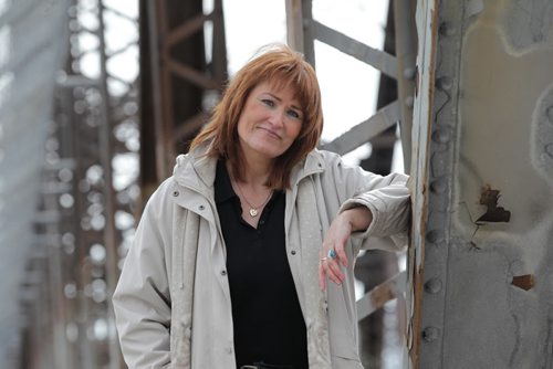 RUTH BONNEVILLE / WINNIPEG FREE PRESS  Cece McIntosh wants city council to consider turning the iconic Arlington bridge into a pedestrian and cyclist overpass instead of tearing it down.  Photos of her on the bridge looking southbound and under the bridge next the the tracks.  See Gordon Sinclair story.  April 01, 2016