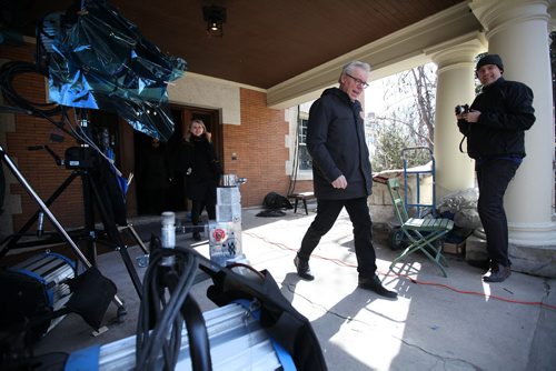 RUTH BONNEVILLE / WINNIPEG FREE PRESS  NDP Leader Greg Selinger walks out of the heritage home and film set at  6 Ruskin Row  after being given a tour after holding a  press conference announcing new supports for film the industry Friday.       April 01, 2016