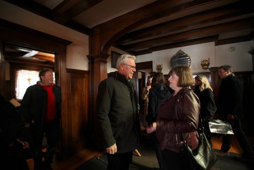 RUTH BONNEVILLE / WINNIPEG FREE PRESS  NDP Leader Greg Selinger chats with Buffalo Gal Pictures - Phyllis Laing on a movie set in a  heritage home at  6 Ruskin Row after holding a press conference announcing new supports for film the industry Friday.       April 01, 2016