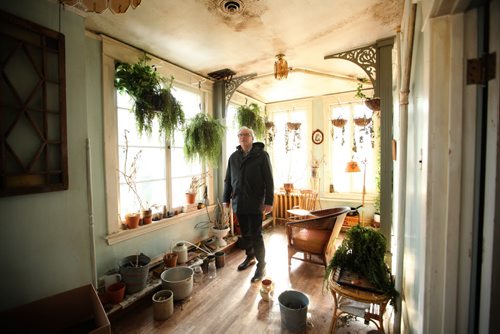 RUTH BONNEVILLE / WINNIPEG FREE PRESS  NDP Leader Greg Selinger views a film set in a heritage home at  6 Ruskin Row  after holding a  press conference announcing new supports for film the industry Friday.       April 01, 2016