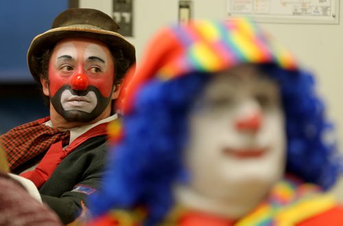TREVOR HAGAN / WINNIPEG FREE PRESS Sleepy the Clown, left, and Mr.Squiggly, during a rehearsal at Crescentwood Community Centre, Thursday, March 31, 2016. They are members of the World Clown Association, and are having a show on April 23rd. 49.8 article for Dave Sanderson.