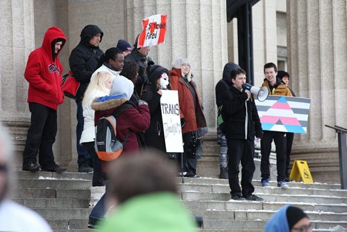 RUTH BONNEVILLE / WINNIPEG FREE PRESS  A small group of anti-CFS rallyers protest in front of the Legislative Building Saturday.  Their event overlapped with World Autism Awareness Day causing confusion and upset for parents of kids with autism.  See Alex Paul story for more info.      April 02, 2016