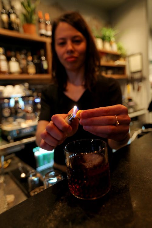 TREVOR HAGAN / WINNIPEG FREE PRESS Owner, Tammie Rocke, making a Negroni cocktail at Close Company for Bartley restaurant review, Saturday, April 2, 2016.