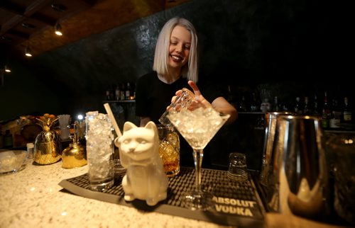 TREVOR HAGAN / WINNIPEG FREE PRESS Elsa Taylor, co-owner and head bartender at The Roost, prepares The Wicked City, Saturday, April 2, 2016. For Bart Kives review.