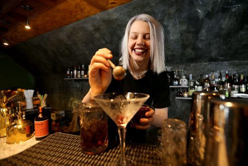 TREVOR HAGAN / WINNIPEG FREE PRESS Elsa Taylor, co-owner and head bartender at The Roost, prepares The Wicked City, Saturday, April 2, 2016. For Bart Kives review.