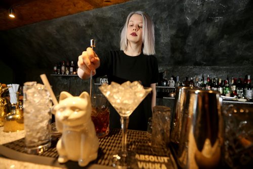 TREVOR HAGAN / WINNIPEG FREE PRESS Elsa Taylor, co-owner and head bartender at The Roost, prepares The Wicked City, Saturday, April 2, 2016. For Bart Kives review.