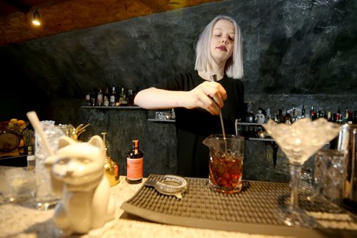 TREVOR HAGAN / WINNIPEG FREE PRESS Elsa Taylor, co-owner and head bartender at The Roost, prepares The Wicked City, Saturday, April 2, 2016. For Bart Kives review.