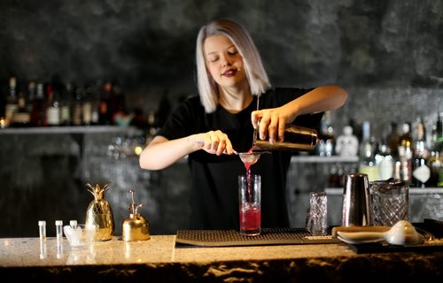 TREVOR HAGAN / WINNIPEG FREE PRESS Elsa Taylor, co-owner and head bartender at The Roost, prepares The Bulletproof, Saturday, April 2, 2016. For Bart Kives review.