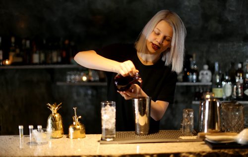 TREVOR HAGAN / WINNIPEG FREE PRESS Elsa Taylor, co-owner and head bartender at The Roost, prepares The Bulletproof, Saturday, April 2, 2016. For Bart Kives review.