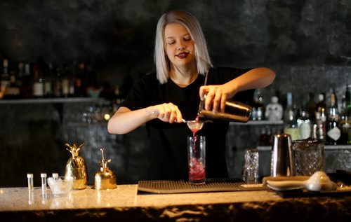 TREVOR HAGAN / WINNIPEG FREE PRESS Elsa Taylor, co-owner and head bartender at The Roost, prepares The Bulletproof, Saturday, April 2, 2016. For Bart Kives review.