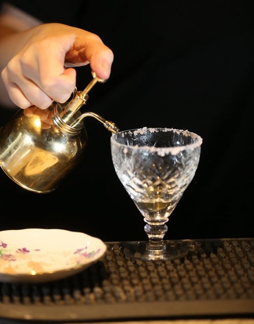 TREVOR HAGAN / WINNIPEG FREE PRESS Elsa Taylor, co-owner and head bartender, prepares a Paradise Lost cocktail at The Roost, prepares The Bulletproof, Saturday, April 2, 2016. For Bart Kives review.