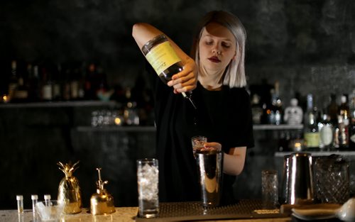 TREVOR HAGAN / WINNIPEG FREE PRESS Elsa Taylor, co-owner and head bartender at The Roost, prepares The Bulletproof, Saturday, April 2, 2016. For Bart Kives review.