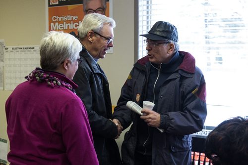 MIKE DEAL / WINNIPEG FREE PRESS NDP leader Greg Selinger talks to Mel Lazareck after dropping by Christine Melnick's campaign office Sunday afternoon to chat with a number of volunteers that were getting ready to go out canvasing. 160403 - Sunday, April 03, 2016