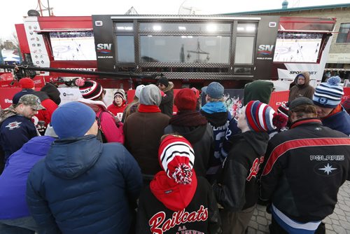 JOHN WOODS / WINNIPEG FREE PRESS Fans watch the Winnipeg Jets at the Hometown Hockey event at The Forks Sunday, April 3, 2016.