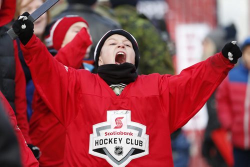 JOHN WOODS / WINNIPEG FREE PRESS Kaden Olson, 8, cheers on the Winnipeg Jets at the Hometown Hockey event at The Forks Sunday, April 3, 2016.