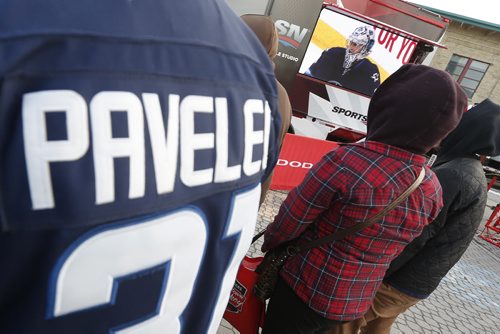 JOHN WOODS / WINNIPEG FREE PRESS Fans watch the Winnipeg Jets at the Hometown Hockey event at The Forks Sunday, April 3, 2016.