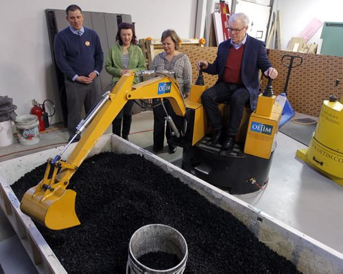 BORIS MINKEVICH / WINNIPEG FREE PRESS NDP makes Trades Announcement at Operating Engineers Training Institute of Manitoba. NDP Leader Greg Selinger has some fun on one of their training machines. Left -Right Watching is NDP candidate for Assiniboia Joe McKellep, NDP candidate for Kirkfield Park Sharon Blady, and OETIM Exec. Dir. Betty Lou Doerksen.(and Greg Selinger on right) April 4, 2016