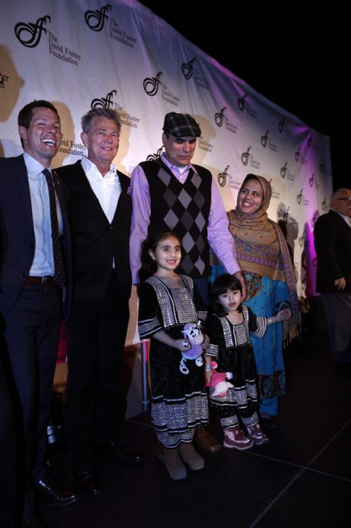 WAYNE GLOWACKI / WINNIPEG FREE PRESS   At an event Monday morning at the CMHR, from left, Mayor Brian Bowman, Grammy Award-winning producer David Foster, ,Jouhar Ali (father) and Alia Jouhar (mother) and their daughters Paghunda and her little sister Nazdana Jan,3, who was born in Portage La Prairie in 2012 with an urea cycle disorder.  In 2013, The David Foster Foundation was able to assist the family after they had returned back to Winnipeg from Calgary with flights, accommodation, transportation and meals to attend the liver transplant assessment at Toronto Sickkids Hospital since there was no transplant program in Manitoba. Nazdana was listed for a liver transplant, and on April 22, 2014 she was given the gift of life when she finally received the liver she so desperately needed. The David Foster Foundation was able to continue supporting the family while they were required to temporarily relocate to Toronto for liver transplant. Throughout Nazdanas recovery there have been many readmissions to hospital, and follow up medical appointments. Although the province of Manitoba was able to reimburse the family for the patient and one parents flight, the family was required to cover the additional costs. At the event Monday David Foster announced his upcoming¤2016 David Foster Foundation Miracle Gala & Concert Sept. 24¤in Winnipeg.¤ Erin Lebar story. WAYNE GLOWACKI / WINNIPEG FREE PRESS April 4 2016  