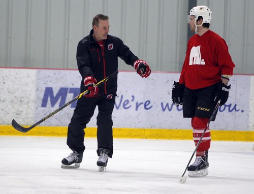 BORIS MINKEVICH / WINNIPEG FREE PRESS One on one ice session between Scott Glennie, right, former first round draft pick and former NHLer turned consultant Adam Oates. Photo taken at MTS Iceplex. April 4, 2016